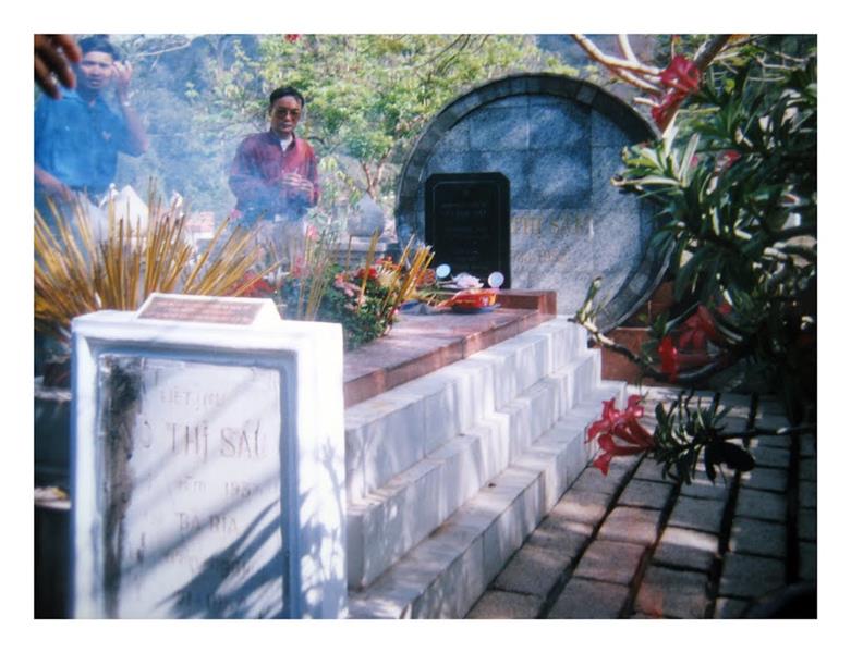 Incensing before Vo Thi Sau Tomb