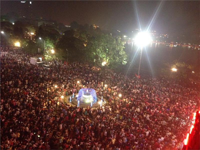 People gather to see firework display in Hanoi