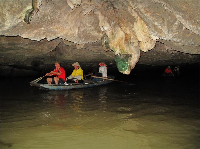 Traversing a cave in Trang An