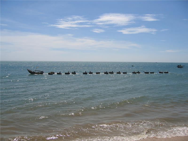 String of fishing boats at Rang Beach