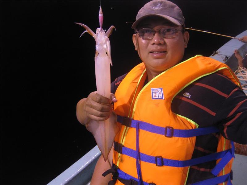 Tourist at squid fishing trips Phu Quoc