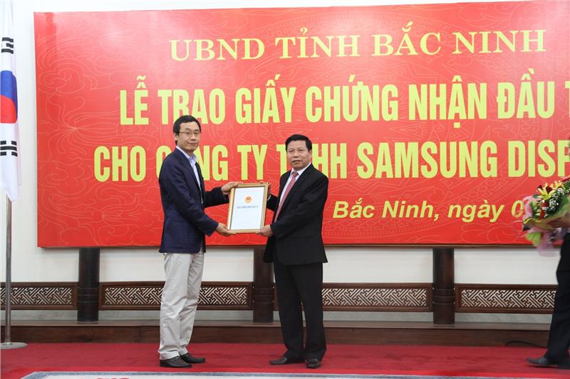 Ceremony of handing license for Samsung Display