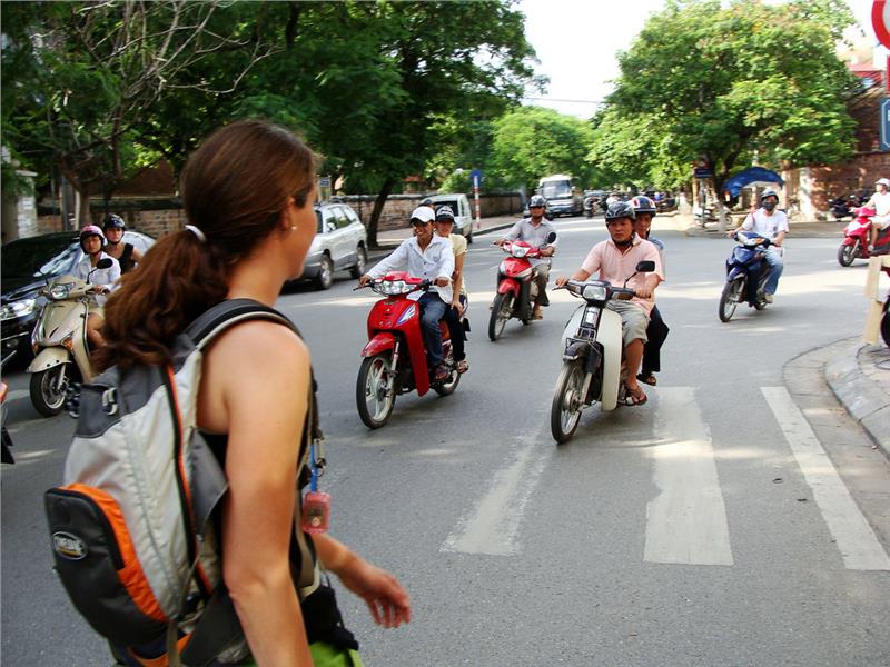 A brave pedestrian crossing Vietnam road
