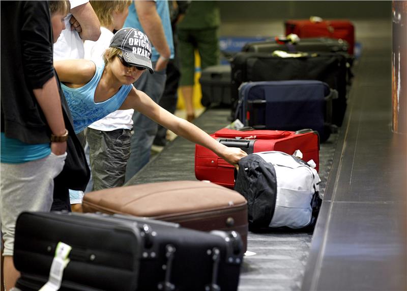 hành lý khi đu máy bay